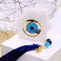 Lucky charm home with resin evil eye