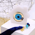 Lucky charm home with resin evil eye