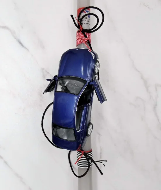 Easter candle with miniature car